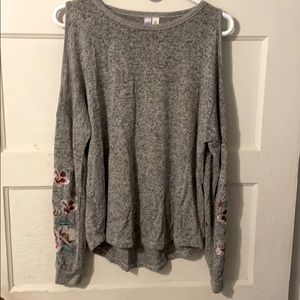 Gray sweater with floral detail
